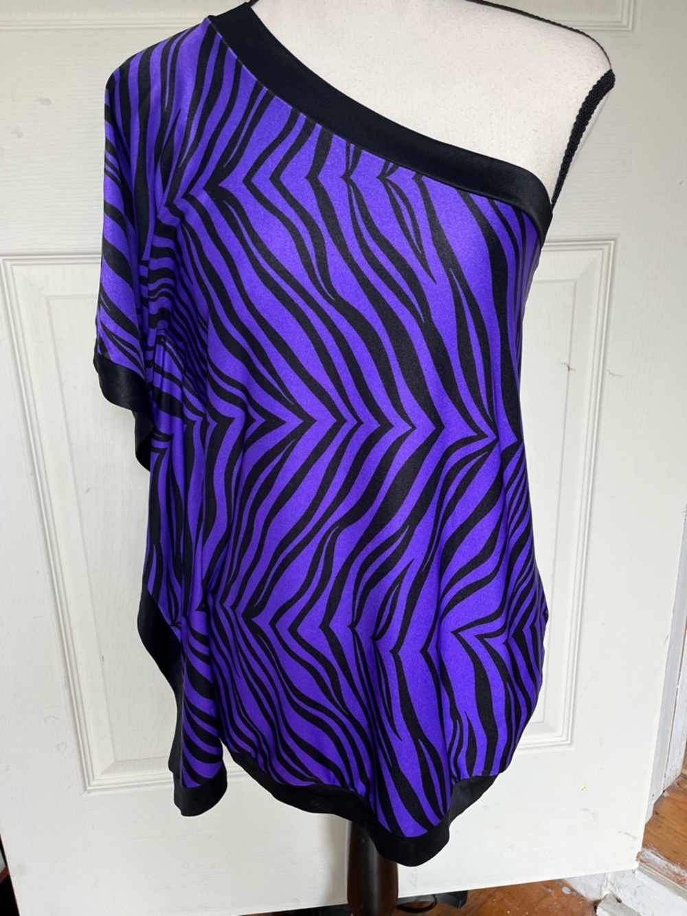 Black& purple one shoulder, Cape top/no brand/material has satin feel medium